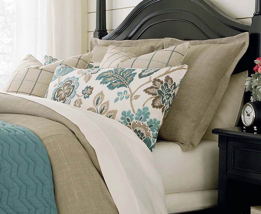 Bedroom bed with decorative pillows