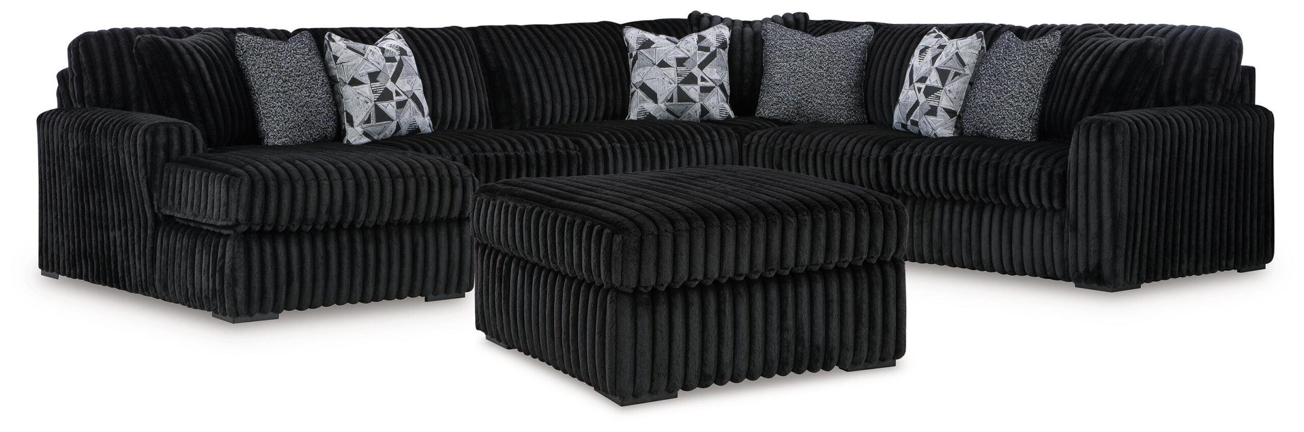 169fcd0019c57fe64faa4f9387f7f26f Midnight-Madness 4-Piece Sectional and Ottoman - Image 1