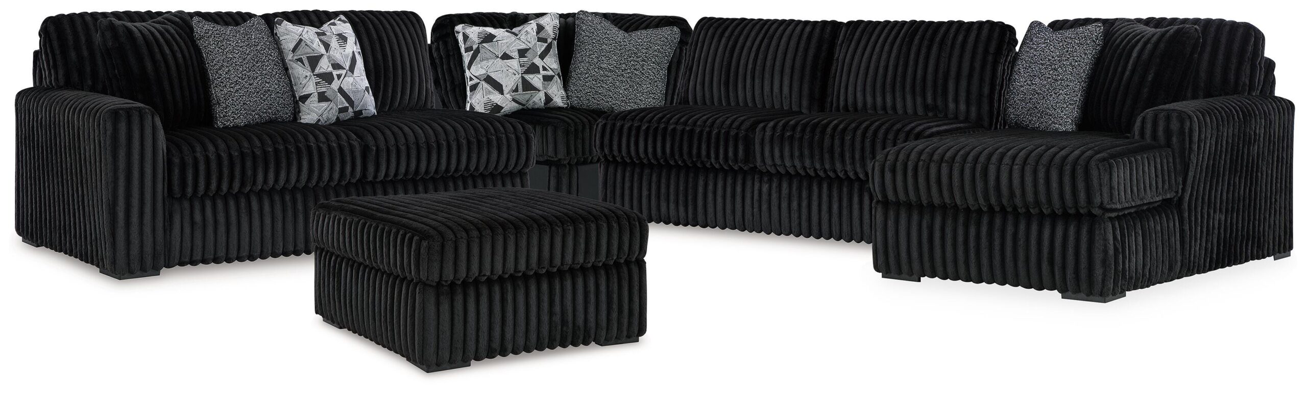 79b8f1bf7960e58988c4518b999b47d4 Midnight-Madness 4-Piece Sectional and Oversized Accent Ottoman - Image 1